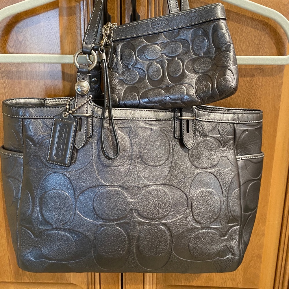Coach two handle tote with cosmetic bag.